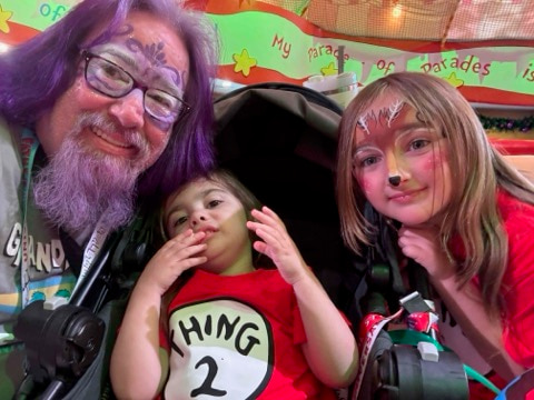 Lawrence Brody with his granddaughters in festive face paint at Disney World, December 2025